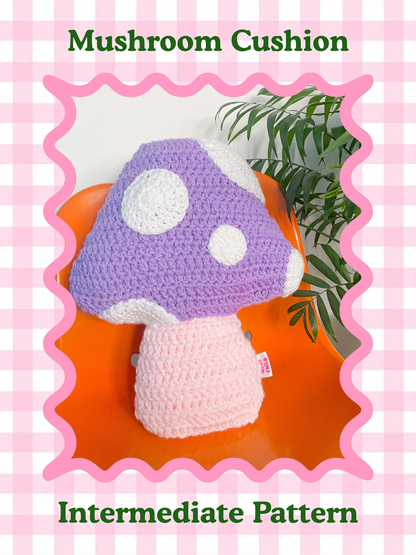 Crocheted mushroom cushion on an orange chair with a pink checkered border