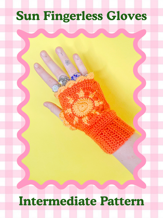 Pattern cover of a hand wearing a orange crocheted fingerless glove with  a yellow sun on it with text saying 'sun fingerless gloves' and the crochet skill level 'intermediate'.
